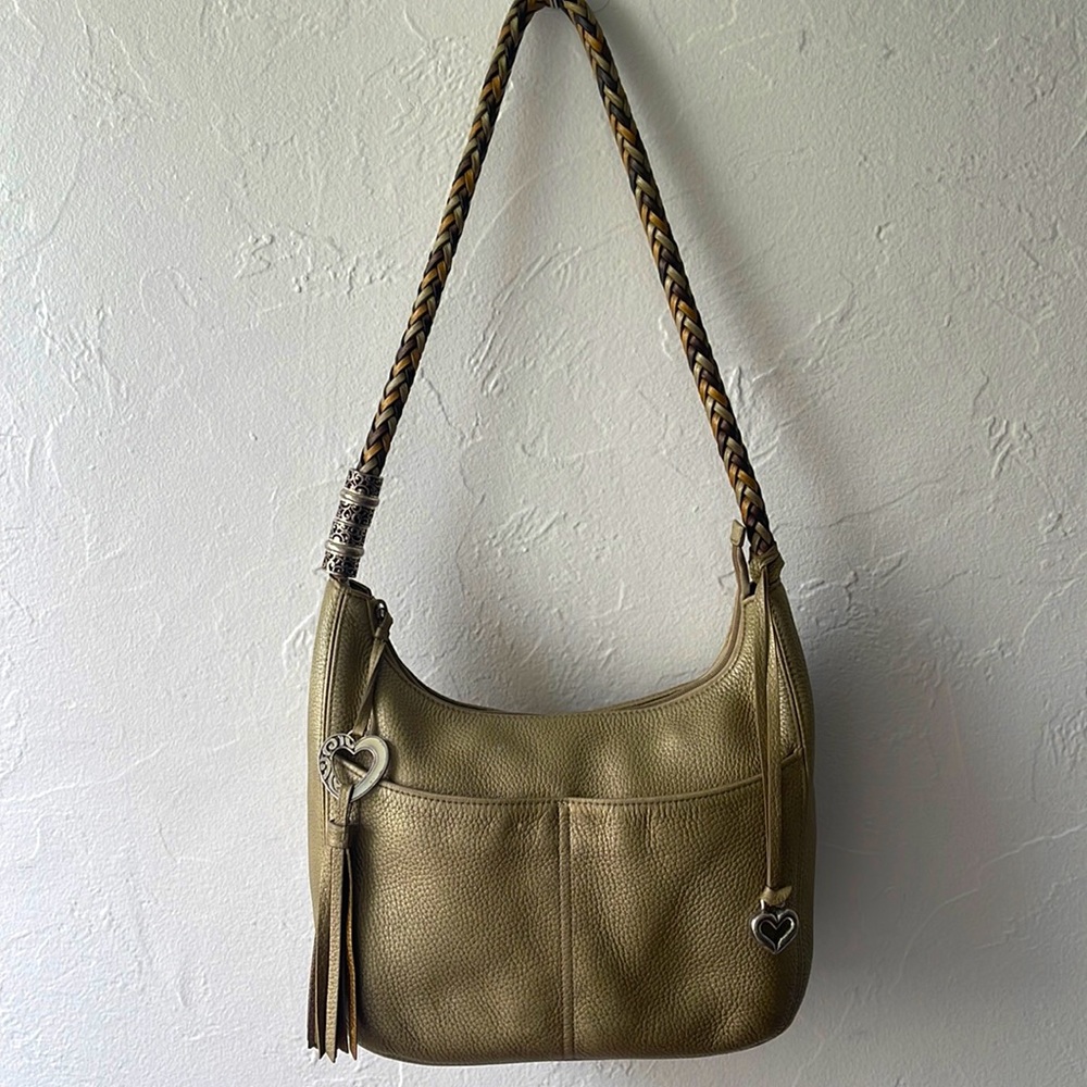 Brighton shoulder bag with jewelry on the strap.